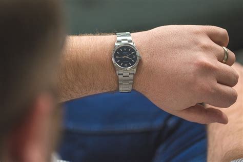 34mm watch on woman's wrist|34mm watch on man's wrist.